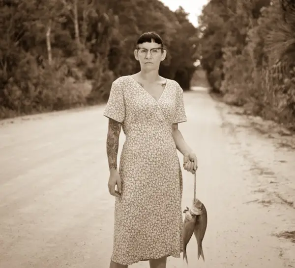The Grand Prix de la Découverte Prize in People/Portraits The haunting simplicity and timeless quality of this image made a memorable first impression with the jury; then came the added bonus of the strange and elegant details.