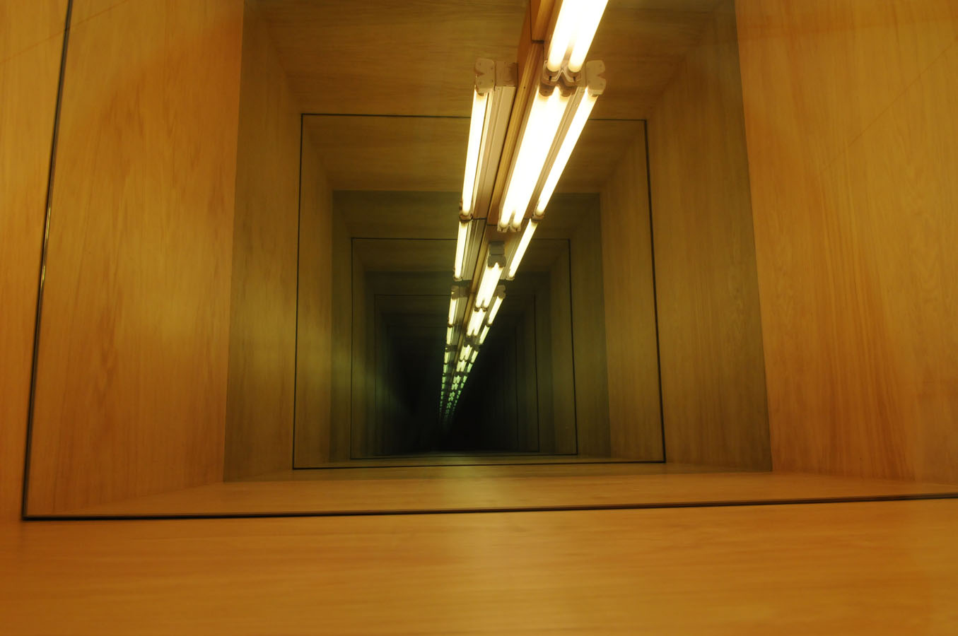 Strong florescent lights emit a very ugly glow, but it the right kind of environment, and the right kind of narrative behind the image, they can make complete a photograph.