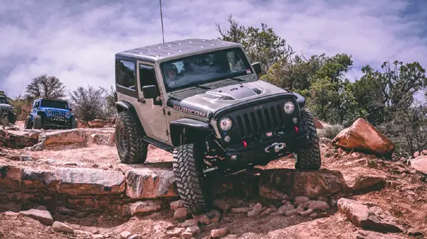 jeeps crawling toward camera