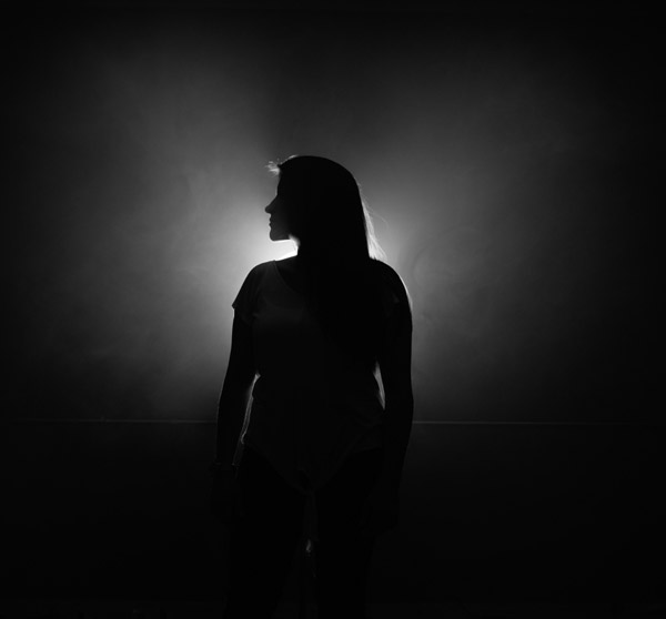 Silhouette portrait focusing on posture and pose